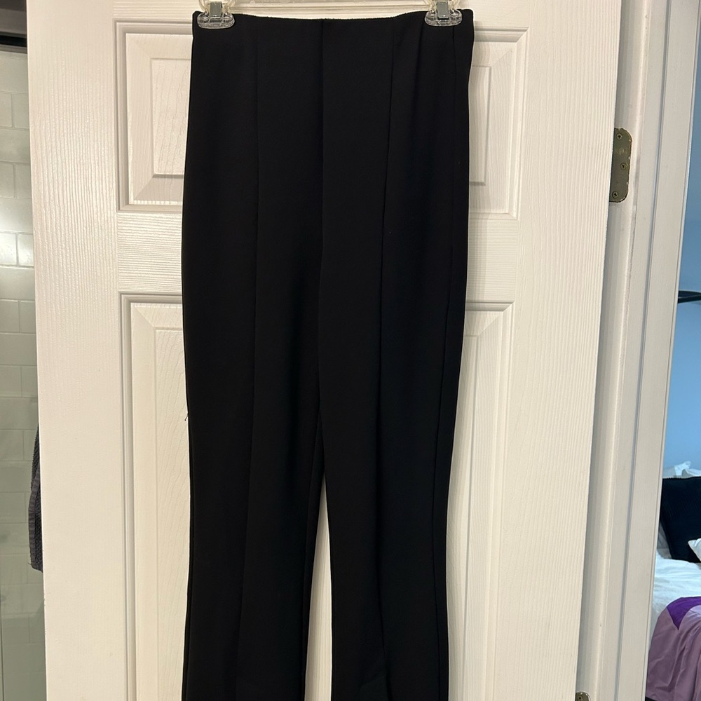 Split flare ankle pant, super stretchy work or casual black pant. Fits a 2 or 4.